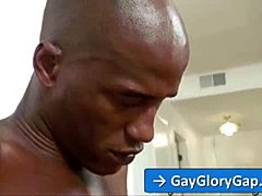 White guy enjoys stroking his huge black cock in gay porn